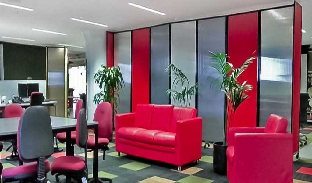 Acoustic portable room divider in office